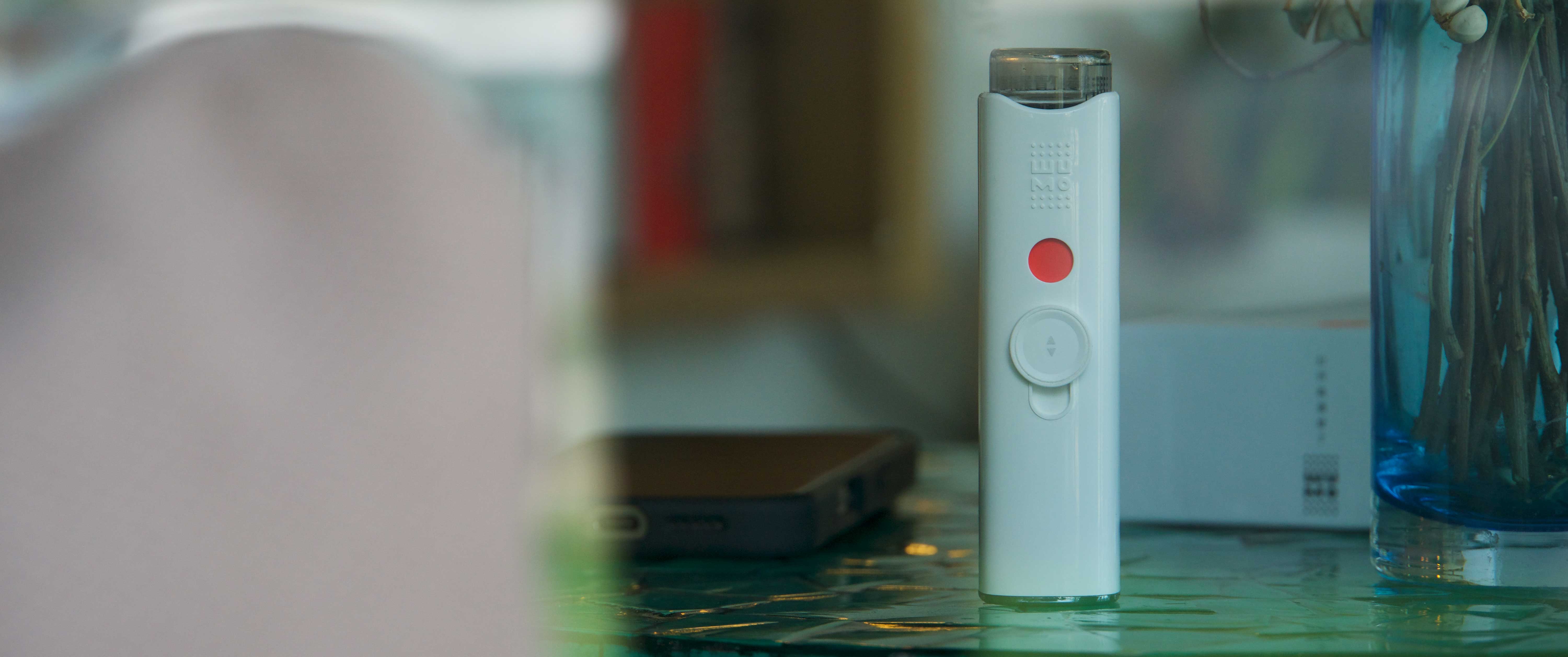 A-detailed-product-shot-of-the-wumo-eye-mister,-highlighting-its-sleek-design-A-mist-nozzle